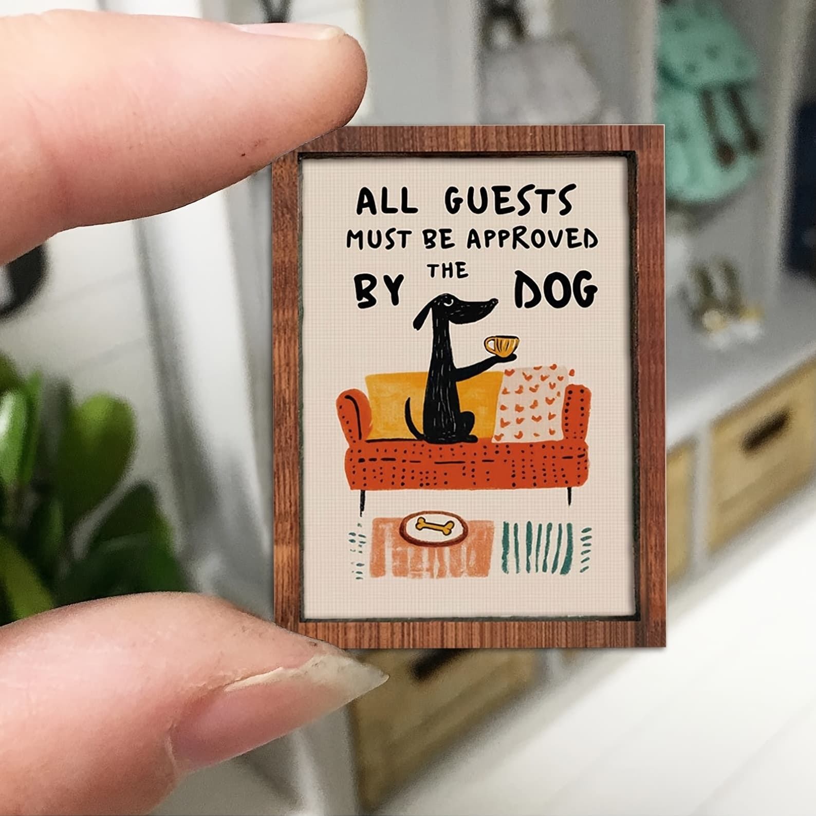 Approved by the dog mini print held in hand